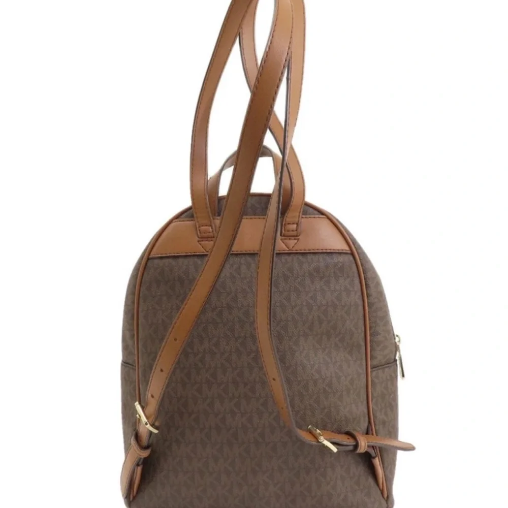 Michael Kors Brown Backpack with Aspen patches sherpa detail like new (RARE)